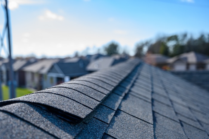 Asphalt shingle room with ridge cap